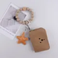 Portachiavi con braccialetto di perle in silicone con ciondolo a stella e portafoglio porta carte donna. - Cachi