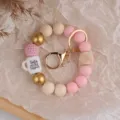 Stilvolles Silikon Perlen Schlüsselanhänger Armband für Lehrer mit schönen Holzperlen. - Rosa