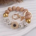 Gänseblümchen Silikon Perlen Schlüsselanhänger Armband, handgemachtes Holzetui Geschenk. - Taupe