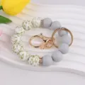 Silicone bead wristlet keychain with gold leopard print and metal clasp for women gifts. - Gray
