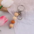 Handgemachter Silikon Perlen Schlüsselanhänger mit Strassabstandhalter und Taschenanhänger. - Orange