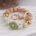 Holz Silikon Perlen Schlüsselarmband mit Gänseblümchen Anhänger schickes Schlüsselanhänger - Grün