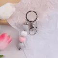 Handgemachte Silikonperlen Schlüsselanhänger mit Strass Abstandshaltern und Metallkarabiner. - Rosa