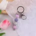 Handgemachte Silikon Perlen Schlüsselanhänger süße Taschenanhänger mit Strass für Damen - Lila