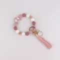 Pulsera llavero de cuentas de luna de silicona con borla, cuentas de madera rosa y blancas. - Rosa Palo