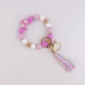 Pulsera llavero de cuentas de silicona con colgante de luna y borlas moradas - Fucsia