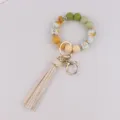 Pulsera llavero de cuentas de silicona con borla, elegante anillo para la muñeca. - Beige