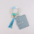 Silikonperlen Armband Schlüsselanhänger mit Quaste und blauem PU Leder Kartenetui. - Blau