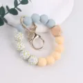 Silicone beaded wristlet keychain with floral silicone and wood beads for keys. - Grey Blue