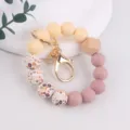 Silicone beaded wristlet keychain with floral printed silicone beads and wooden charm. - Dusty Pink