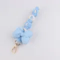 Handmade woven phone charm blue bow daisy keychain cute bag strap accessory style - Blue