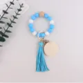 Silicone bead keychain bracelet with tassel and wooden charm for women and daily use gift - Dark Blue