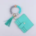 Llavero de pulsera de cuentas de silicona con tarjetero de cuero PU y borla para mujeres. - Verde