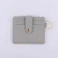 Grey PU leather card holder with scalloped edge, snap closure, and keychain ring. Chic. - Gray