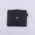 Black PU leather card holder with key ring and snap button. Compact and portable wallet. - Black