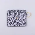 Black and white leopard print PU leather card holder wallet with key ring and snap closure. - Black and White Leopard Print