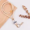 Houten kraal lanyard sleutelhanger met siliconen madeliefje boek bedels en kwast. - Beige