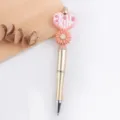 Kreativer DIY Gänseblümchen Herz Silikon Perlenstift, süßer Cartoon Metall Schreibstift. - Rosa Herz Blume