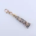 Leopardmusters Leder Quaste Schlüsselanhänger mit Gold Verschluss 8cm Tasche Accessoire - Leopardenmuster