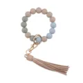 Silicone bead wristlet keychain detail featuring colorful round beads and chic leather tassel. - Khaki
