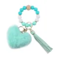Portachiavi da polso in perle di silicone con ciondolo cuore in peluche verde menta - Verde di Natale