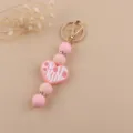 Pink silicone beaded keychain with heart pendant, cute rhinestone spacers and gold lobster clasp. - Pink