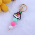 Kleurrijke siliconen kralen sleutelhanger met appel boek hanger, leuke tas accessoire gift. - Boek En Appel