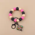 Detalle pulsera llavero cuentas silicona, colgante leopardo profesor, accesorio - Redondo