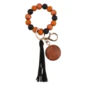 Silicone and wood bead wristlet keychain with black PU leather tassel and MAMA pendant accessory. - Light Coffee