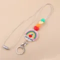 Colgante llavero de maestro con cuentas de silicona coloridas y detalle de arco iris. - Lápiz Arcoiris
