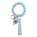 Silicone beaded wristlet keychain detail featuring a cute blue butterfly pendant and chic leather tassel. - Blue