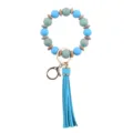Llavero de pulsera de cuentas de silicona y madera azul con borla de cuero PU y anilla dorada. - Azul
