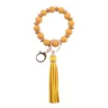 Llavero de pulsera de cuentas amarillas con borla de cuero PU silicona y cuentas de madera - Amarillo jengibre