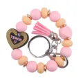 Silicone beaded wristlet keychain with pink tassel and teacher heart charm for daily bag accessory. - Wristband