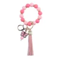 Silicone bead keychain with pink butterfly charm and faux leather tassel for women accessories. - Pink