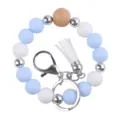 Silicone beaded wristlet keychain featuring wooden and metal beads with a white PU leather tassel. - Light Blue
