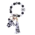 Silicone bead wristlet keychain with cow print, tassel and cute charms for women and girls daily use. - ship