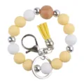 Silicone beaded bracelet keychain with wood bead, PU leather tassel and metal hardware clasp. - Light Yellow