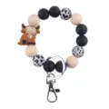 Hooglandrund silicone kraal polsband sleutelhanger met houten kralen en metalen sluiting. - Bruin Armband
