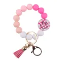 Pink gradient silicone beaded bracelet keychain with smiley face pendant and cute leather tassel. - Pink