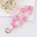 Handgemachte Gewebte Gänseblümchen Perle Schlüsselanhänger Rosa Baumwollseil Taschenanhänger - Rosa