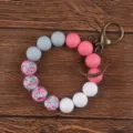 Silicone bead wristlet keychain with floral printed balls and metal clasp for daily use - Watermelon red