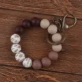 Silicone beaded wristlet keychain with gradient color and chic leaf print for women. - Khaki