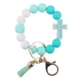 Silicone beaded keychain bracelet with cute cross pendant and tassel for women daily use. - Green