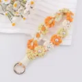 Handgemachte Häkel-Gänseblümchen Perlen Schlüsselanhänger Baumwolle geflochtene Handschlaufe - Orange