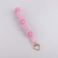 Rosa gehäkelte Handyschlaufe Armband mit Perlen und süßem goldenen Herzverschluss Variante. - Rosa