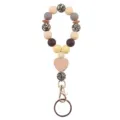 Silicone wooden beaded wristlet keychain with heart charm and gold clasp stylish accessory. - Nude