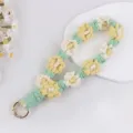 Laccetto per telefono margherita all'uncinetto fatto a mano, variante portachiavi in cotone. - Giallo chiaro