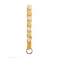 Handmade woven cotton rope keychain with cute dog paw pattern and gold ring for keys or bags. - Turmeric