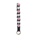Handmade woven dog paw cotton rope keychain lanyard stylish key ring pendant for daily use. - Black Pink
